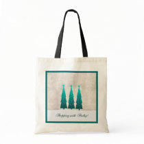 3 Christmas trees in teal bags