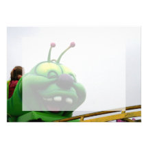 A green caterpillar goofy fair ride image announcement