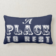 A Place to rest throw pillow in navy blue and sand