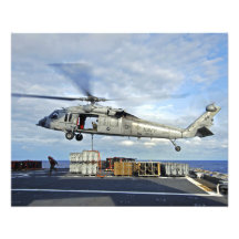 An MH-60S Seahawk prepares to deliver ammunitio Art Photo