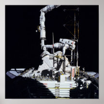 Astronaut working in the cargo bay (STS-61B) Poster