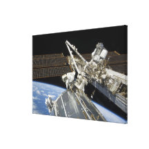 Astronauts perform a series of tasks canvas print