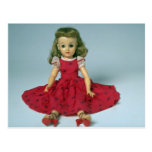 Baby girl doll dressed in red postcard