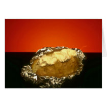 Baked potato with sour cream, against orange backg cards