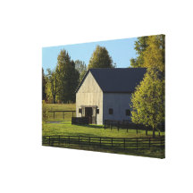 Barn on thoroughbred horse farm at sunrise, canvas prints