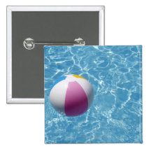 Beach ball in swimming pool pinback button