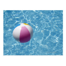 Beach ball in swimming pool post cards