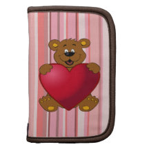Bear holding heart planner