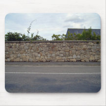 Beautiful Shot of Stone Wall and Plants Against Bl Mousepads