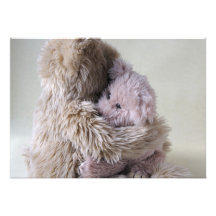 big teddy bear holds little bear invitation
