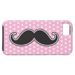 Black handlebar moustache on girly pink polka dots