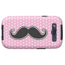 Black handlebar moustache on girly pink polka dots