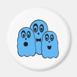 Blue ghosts on white fridge magnets