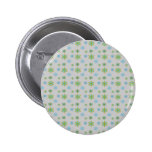 Blue green snowflakes on silver buttons