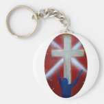 Blue Man raises arms up to cross on red back Keychains