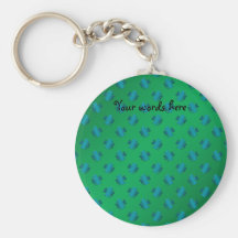 Blue shamrocks on green background keychain