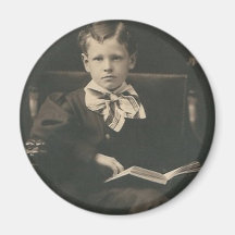 boy reading book magnet