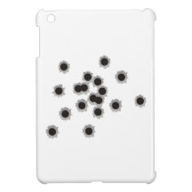 Bullet holes from a rifle or gun, possibly shotgun