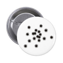 Bullet holes from a rifle or gun, possibly shotgun buttons