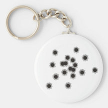 Bullet holes from a rifle or gun, possibly shotgun key chains