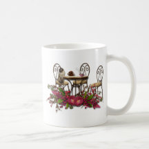 cat resting on chair mug