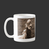 Child Feeding Goat mugs