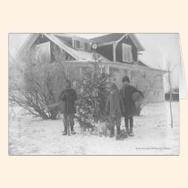 Children outside with Christmas tree cards