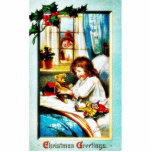 Christmas greeting with a girl playing with toy an photo cut out
