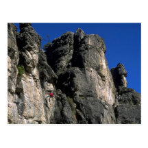 Climbing the vertical, Utah rock formation Post Card