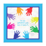 Colourful kids handprints with blue borders canvas prints