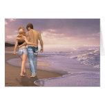 Couple in Love Walking on Beach into the Sunset Greeting Cards