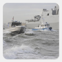 Crews from the coast guard and police departmen square stickers