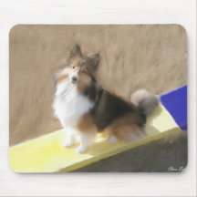 CuteShetland Sheepdog sitting on a teeter Mousepad