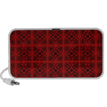 Damask on dark red notebook speaker