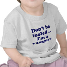 Dont be fooled... Im a vampire Tee Shirts