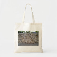 Dry Stone Wall With Plants Besides Road Bag