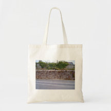 Dry Stone Wall With Plants Besides Road Tote Bags