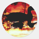 Duck and chick at sunset round stickers