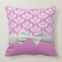 Fake white ribbon bow on pink pillow