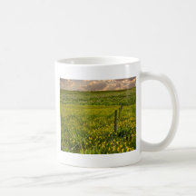 Field with fence and flowers mug