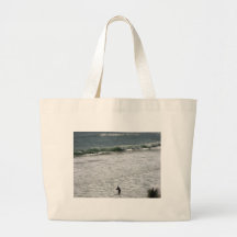 Fishing Man in the Montauk Ocean Canvas Bags