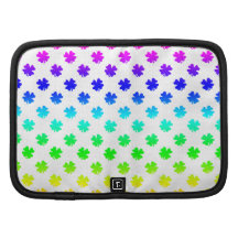 Four leaf clovers in rainbow folio planner