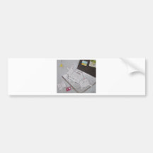 Frenchy resting on laptop bumper sticker