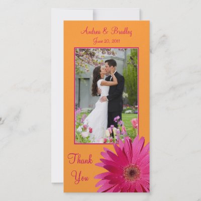The text and wedding photograph on this pink gerbera daisy thank you card is