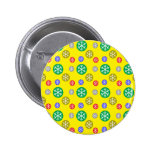 Gold silver red green snowflakes on yellow buttons