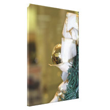 Golden christmas bauble canvas print