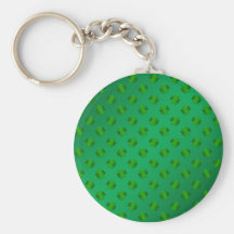 Green shamrock's on green background keychain