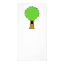 Green tree cartoon with creature. picture card