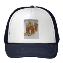 Iced tea in glass tumbler with lemon slice hats