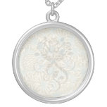 intricate art nouveau pine cone art pendant